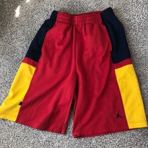 Red, yellow and navy Jordan basketball shorts